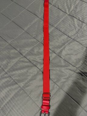 Under Armour Red Fabric Strap with Metal Hardware length 38” adjustable elastic